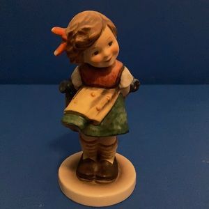 Goebel Hummel “Bashful Little Girl with Flowers”